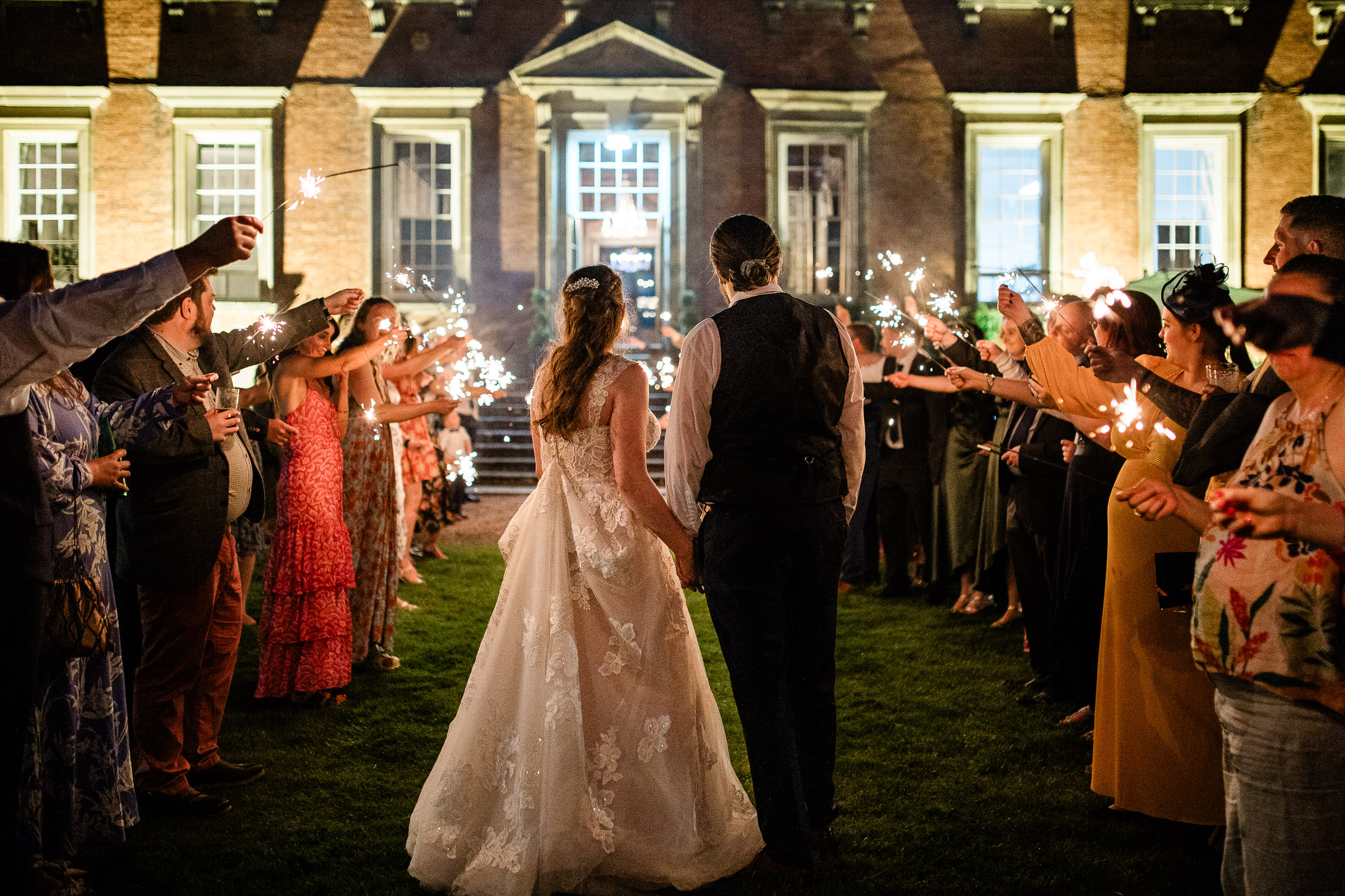 Documentary style photography for the sparklers at Davenport House wedding venue