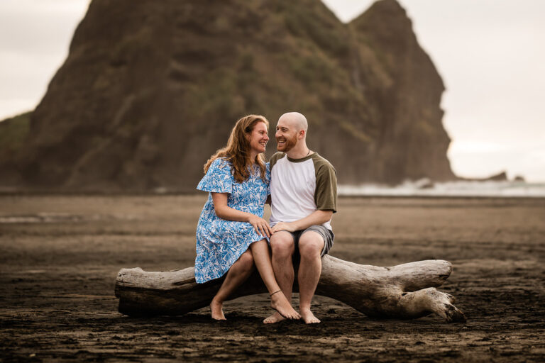 A candid, romantic moment between partners during an engagement shoot by a documentary wedding photographer