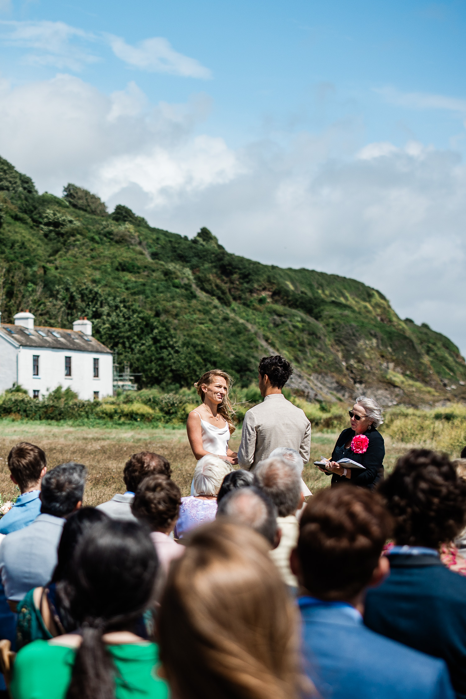 A couple say their vows during wedding photography in the South West