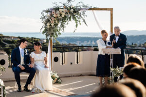 A documentary style capture during the parents of the groom's speech during a wedding ceremony