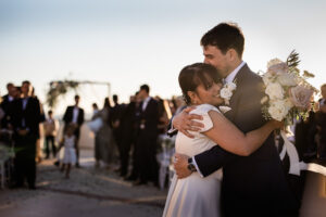 A documentary style capture of a bride and groom by a chateau de cremat wedding photographer