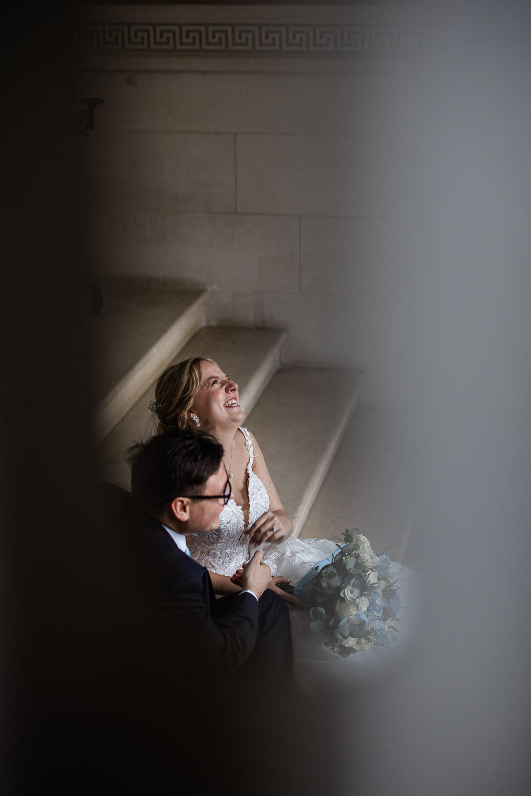 Documentary wedding photographer capture of a bride and groom during couple photos at Pynes House