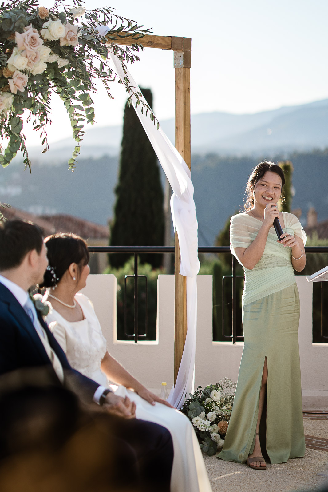 A ceremony speech during an outdoor wedding at a French destination wedding at Chateau de Cremat, in Nice