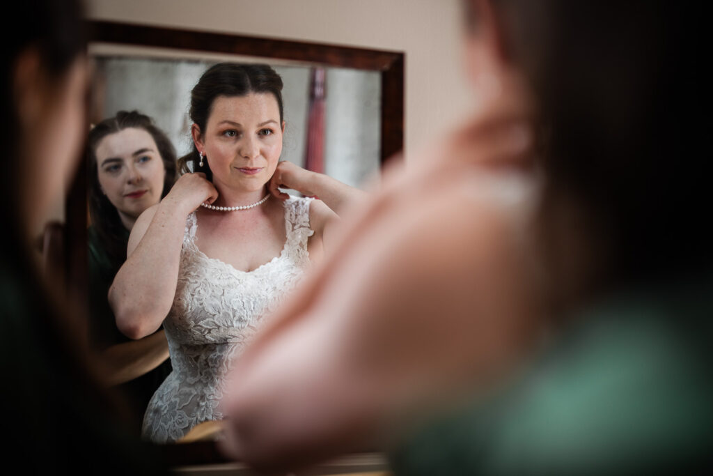 Candid wedding photography during the bridal preparations at Davenport House