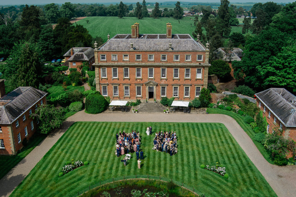An outdoor wedding ceremony captured by a Davenport House wedding photographer
