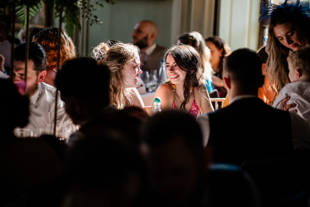 Documentary wedding photography captures during the reception, by a Davenport House wedding photographer