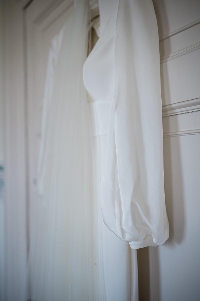 The wedding dress, during bridal preparations