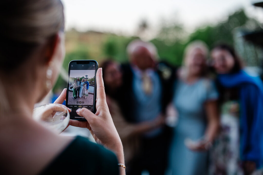Candid capture of wedding guests during a country house wedding
