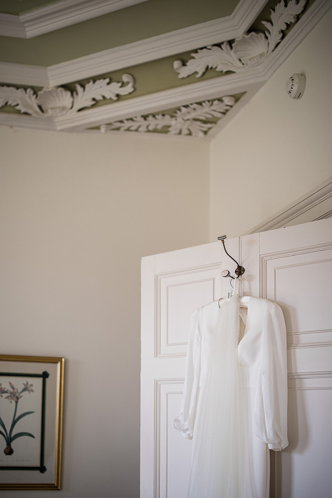 The wedding dress, during bridal preparations