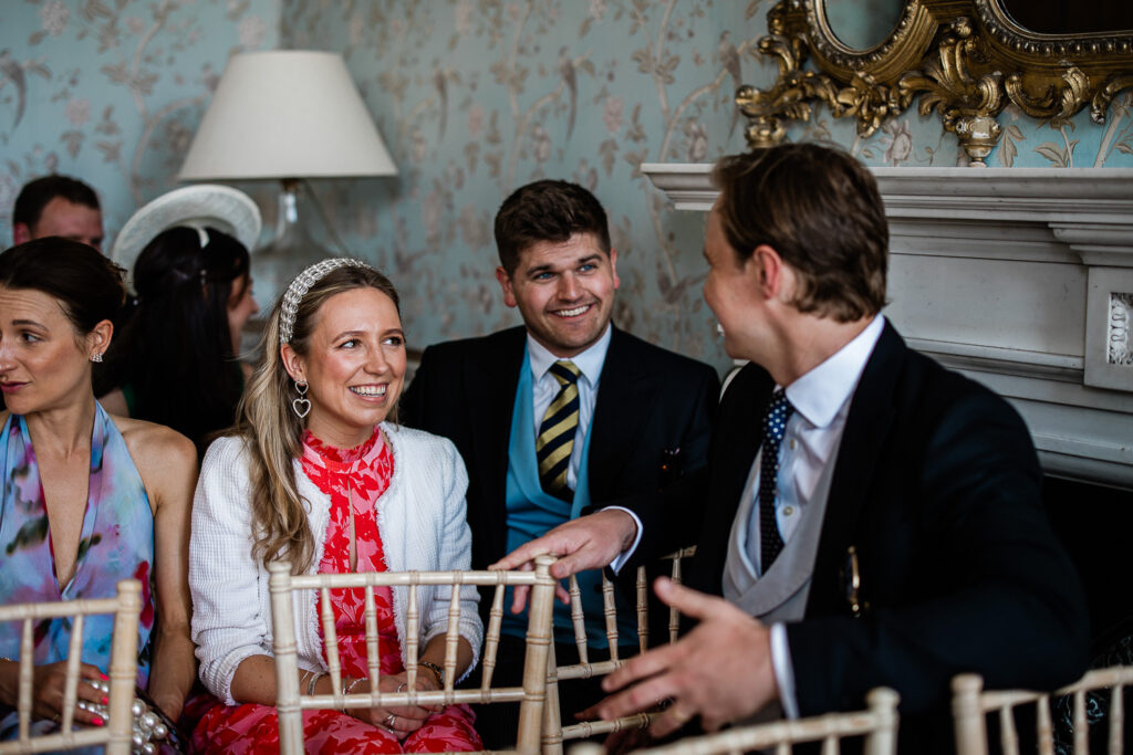 Candid guest reactions during a stately home wedding, captured by Laura Rosemary Photography