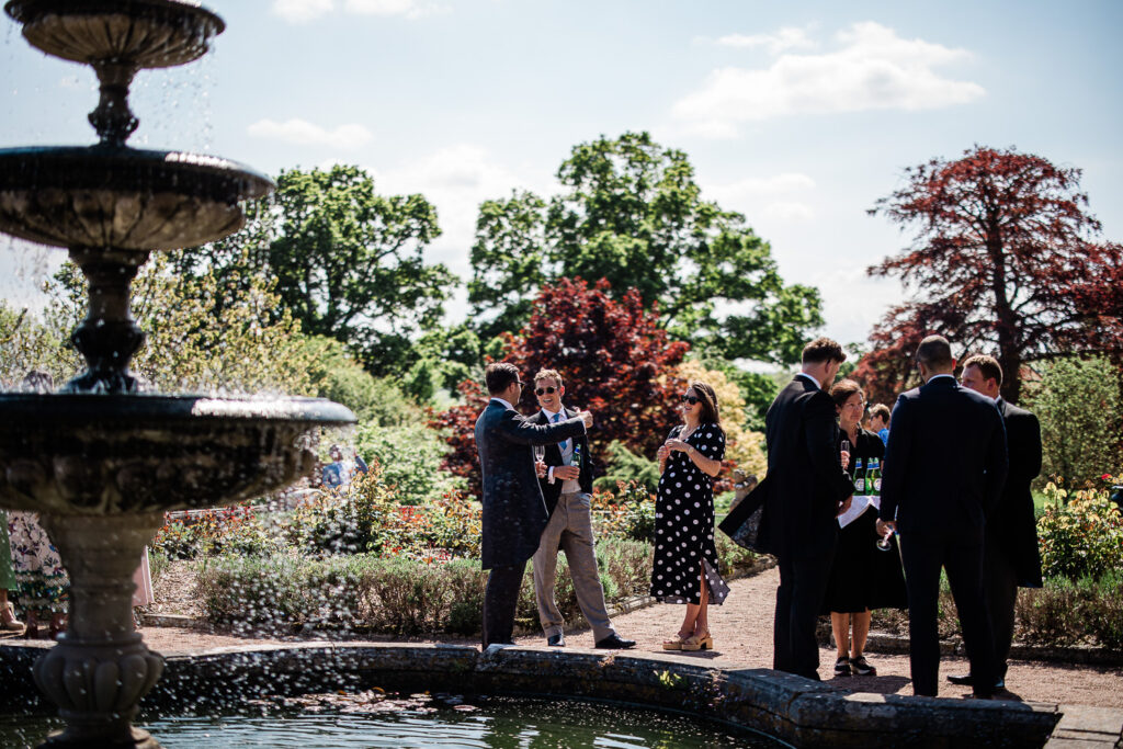 Outdoor wedding reception captured by wedding photographer at Pynes House