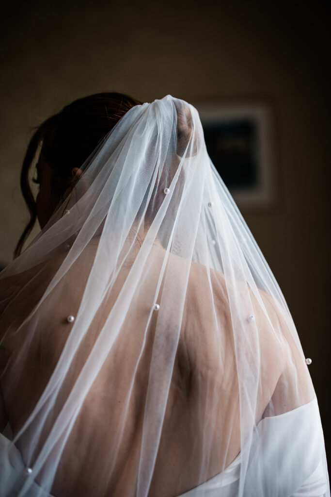 The bride prepares for her wedding ceremony captured by a Bovey Castle wedding photographer