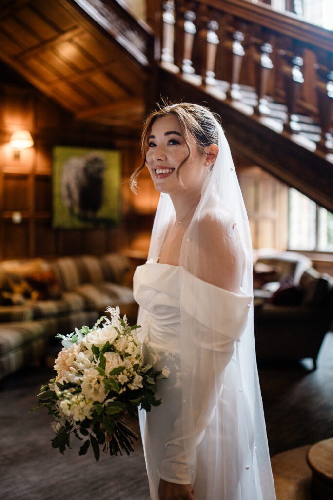 The bride prepares for her wedding ceremony captured by a Bovey Castle wedding photographer