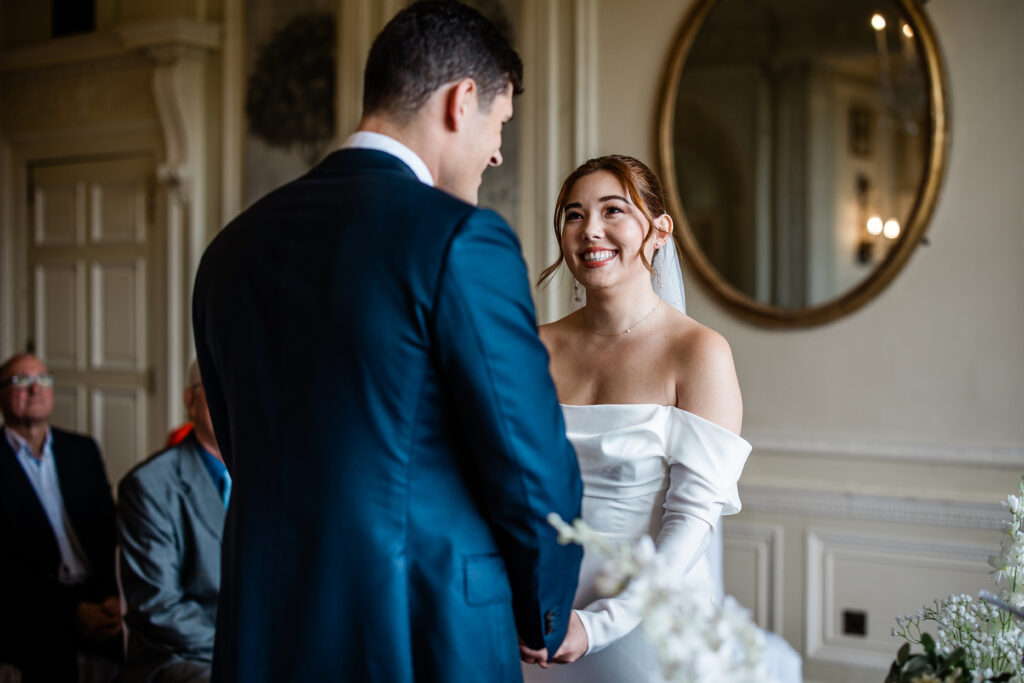 A bride and groom stand at the aisle together, during a Bovey Castle wedding