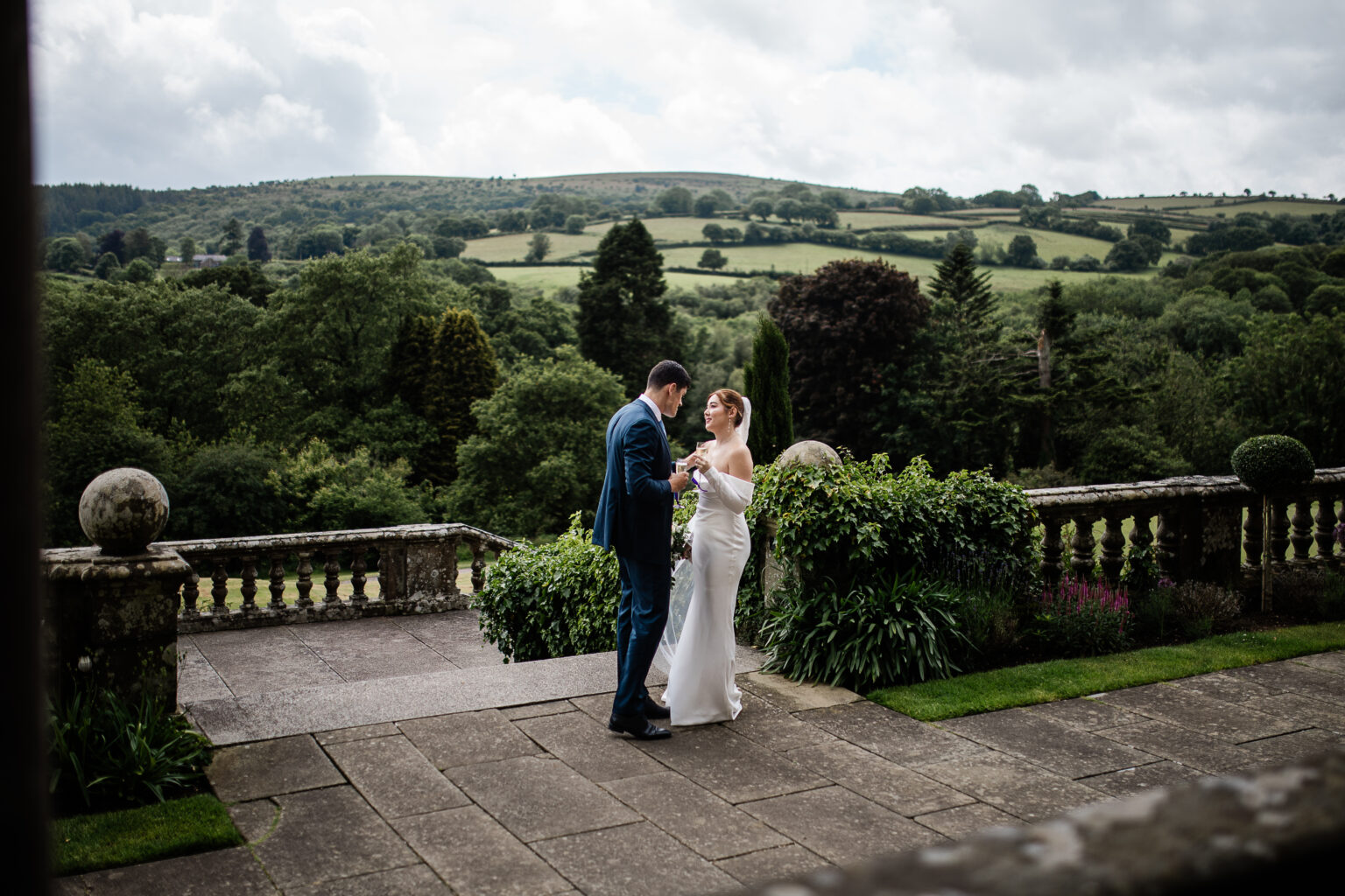 Candid couple photos by a Bovey Castle wedding photographer