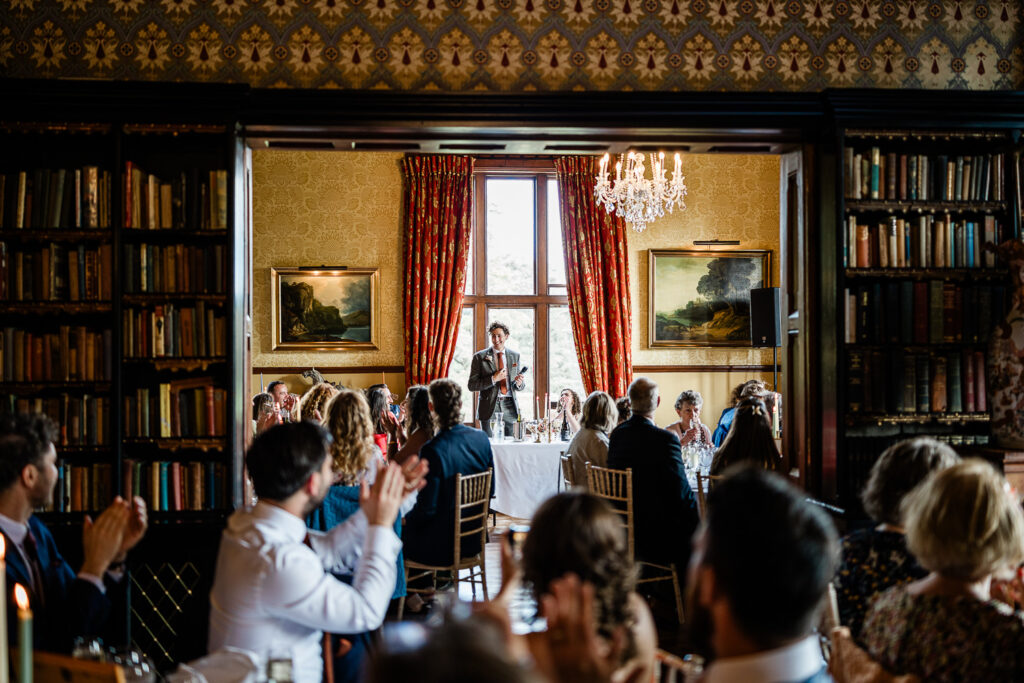a bride and groom door their wedding speech, at a country house wedding venue in devon