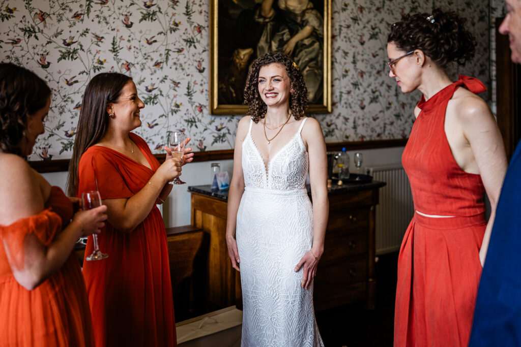candid bridal preparations captured by a wedding photographer at huntsham court