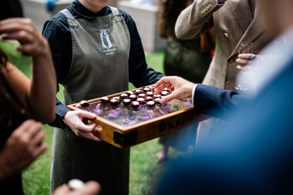 candid guest reactions by a documentary wedding photographer at huntsham court