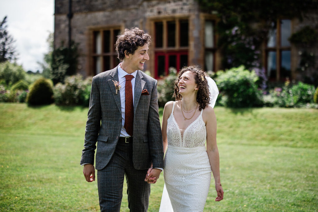 candid couple photos by a wedding photographer at huntsham court
