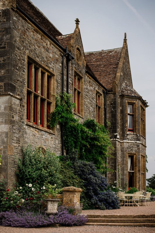 A tudor manor house on the border of Somerset and Devon, named Huntsham Court.