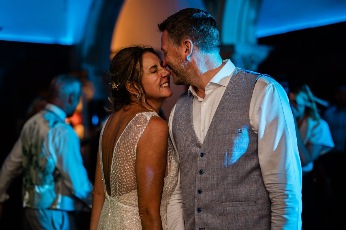 A romantic moment between two newly weds, during the evening dancing.