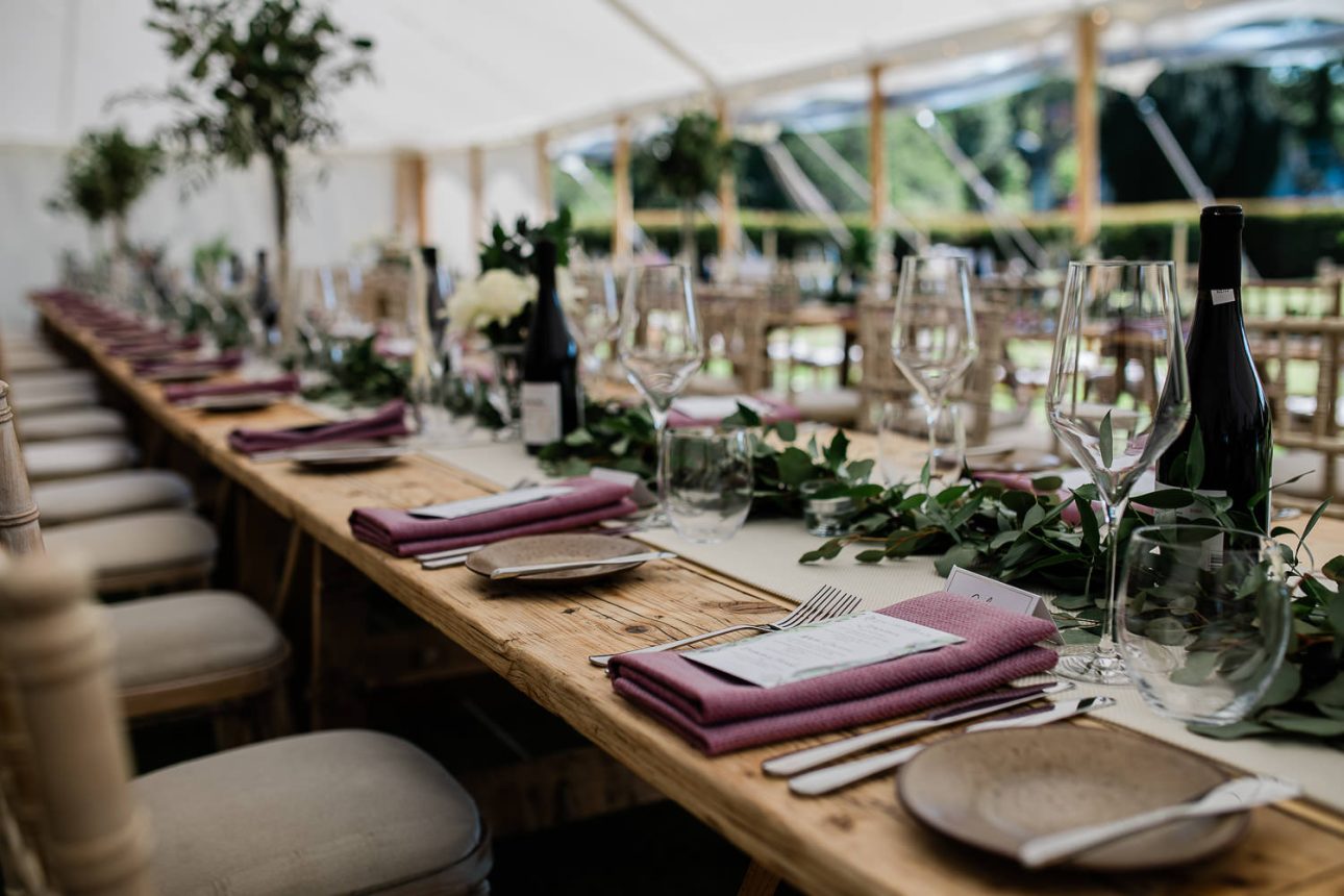 A marquee reception layout, in a minimalist style.