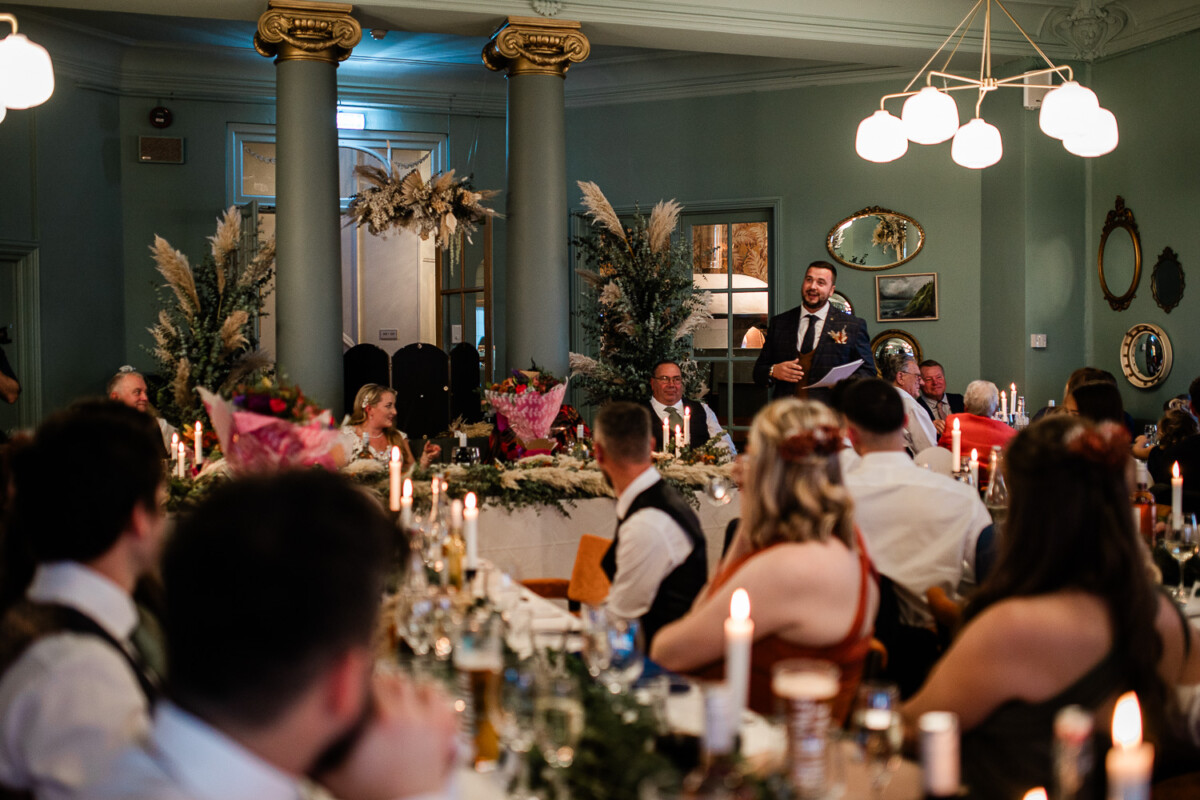 Polurrian on the lizard wedding photography of guests toasting during wedding speeches