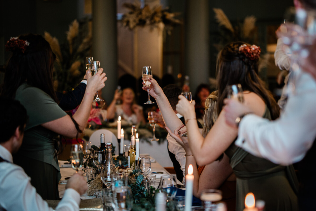 Polurrian on the lizard wedding photography of guests toasting during wedding speeches