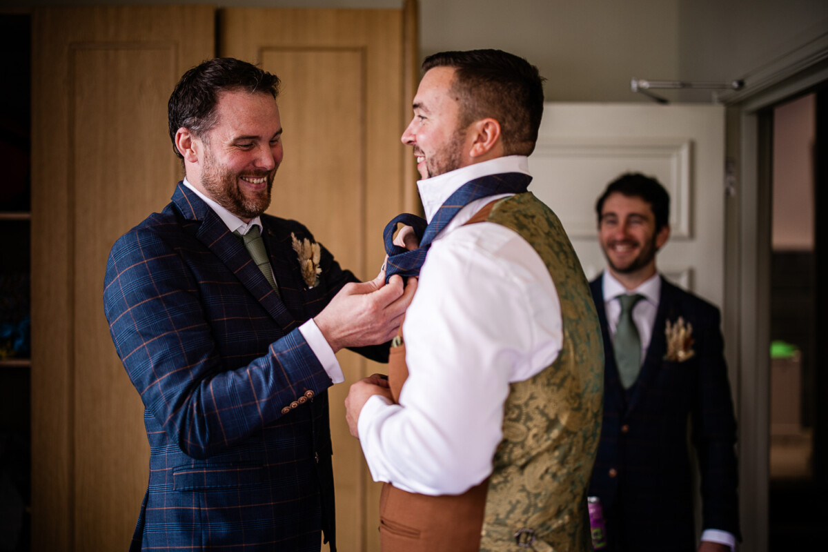 The groomsmen prepare for the wedding