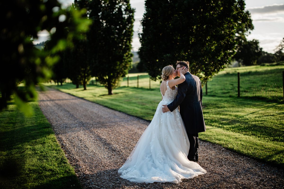 A bride and groom at Pynes House wedding venue