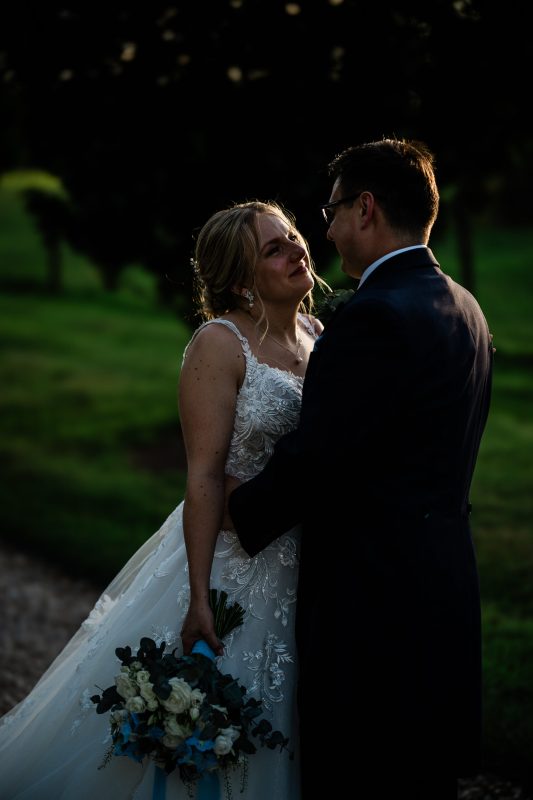 A bride and groom at Pynes House wedding venue