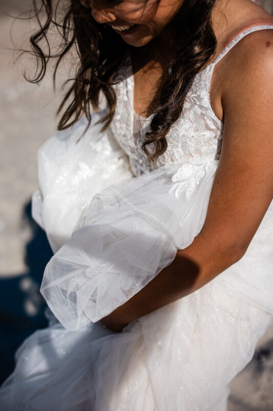 An adventurous bride on the beach in NZ