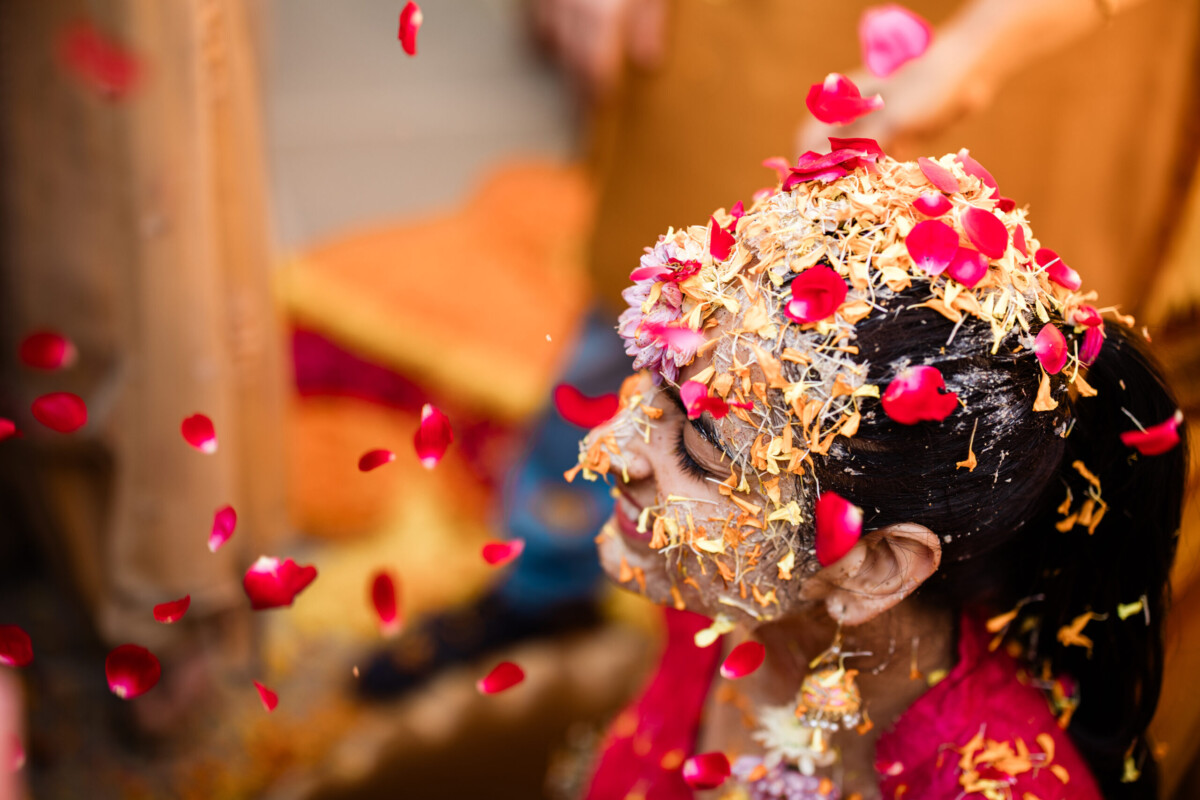 An Indian bride during a Haldi ceremony, captured by Laura Rosemary Photography