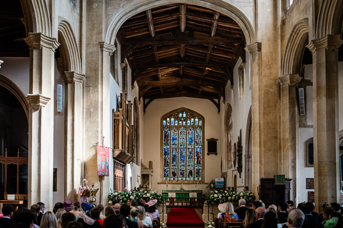 A bride and groom during their church ceremony in the Cotswolds