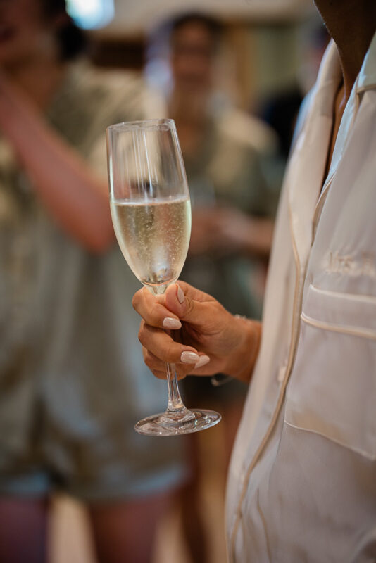 the bride prepares for her wedding ceremony at norton grounds in the cotswolds