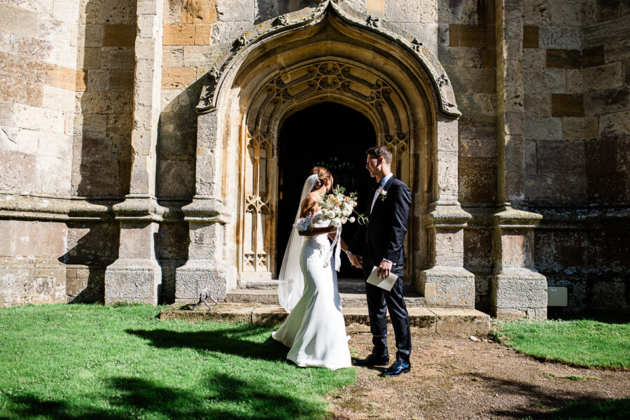 Cotswolds wedding photographer capture of a bride and groom at Chipping Norton church