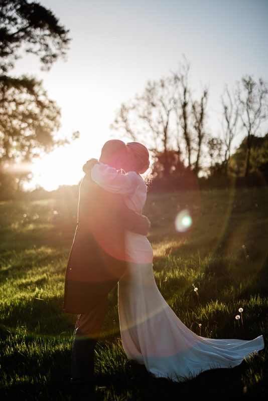 Candid couple photos during golden hour at Pynes stately home wedding venue