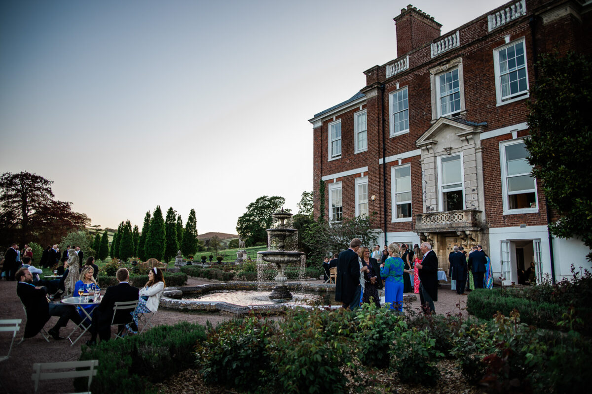 English country house wedding photographer during cocktail hour