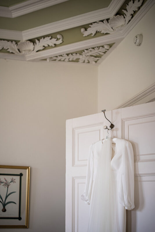 The wedding dress, during bridal preparations