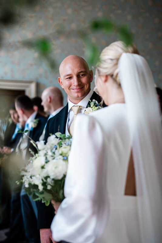 Documentary wedding photography during ceremony at Pynes House