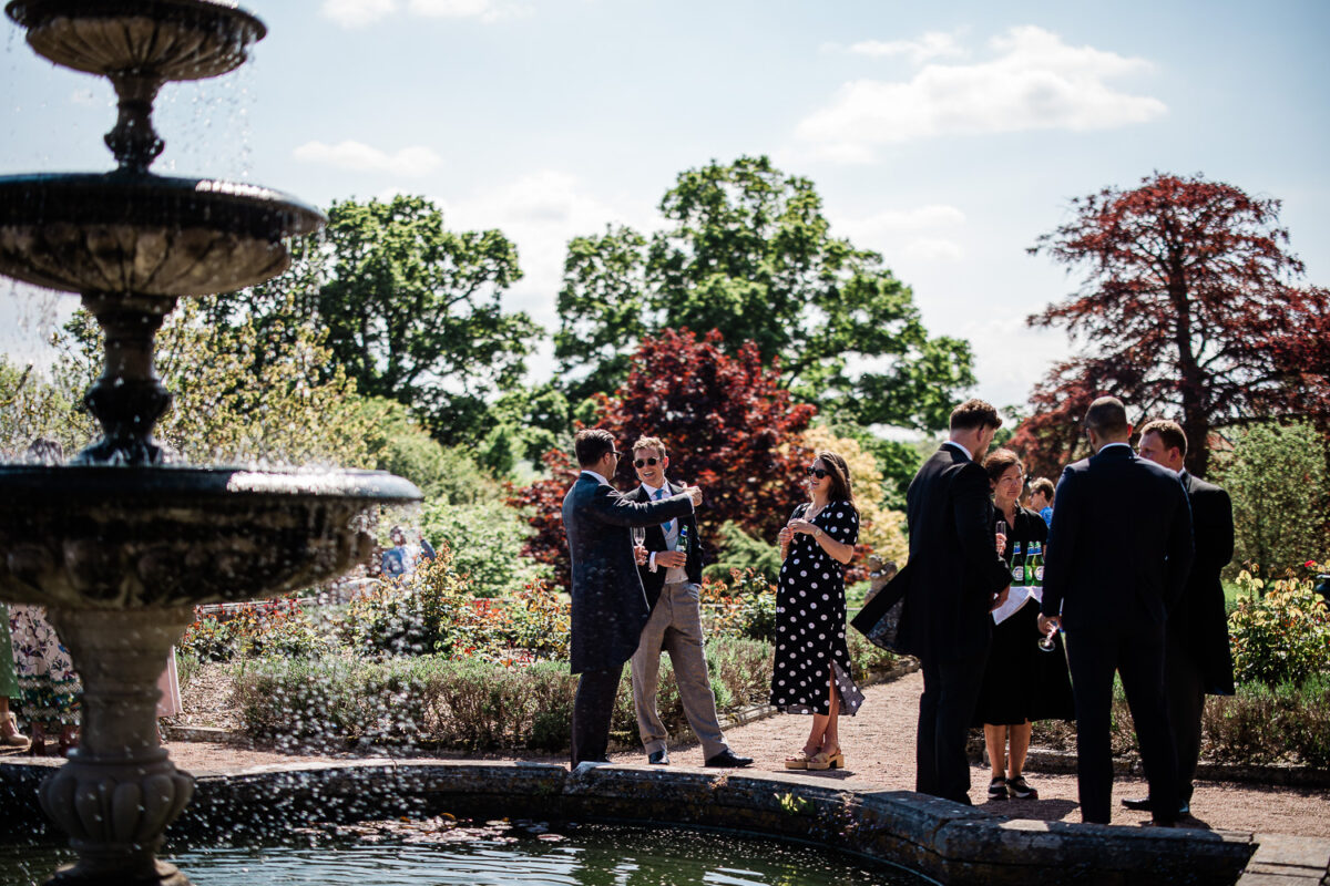 Outdoor wedding reception captured by wedding photographer at Pynes House
