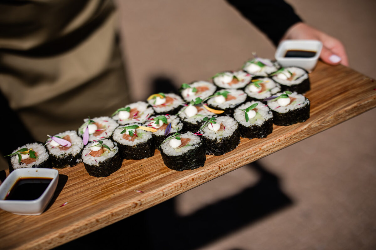 Outdoor wedding reception captured by wedding photographer at Pynes House